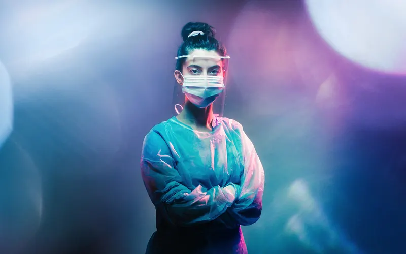 GSK brand image: a healthcare worker in protective gear